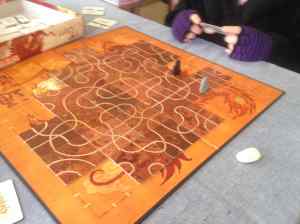 Photo of two people playing Tsuro
